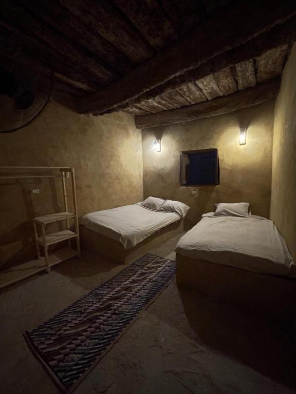 Postel nebo postele na pokoji v ubytování Lotus House