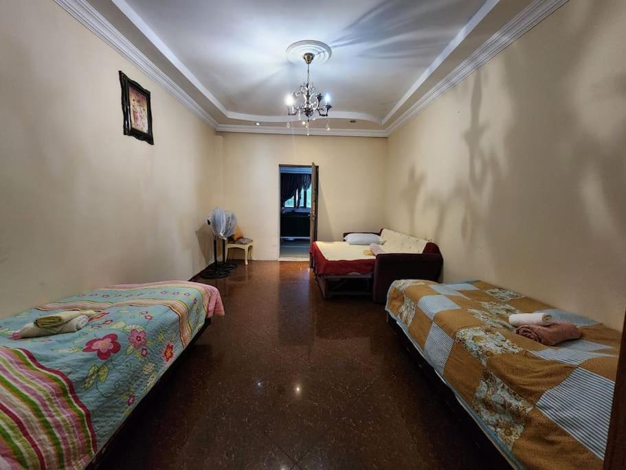 Postel nebo postele na pokoji v ubytování Tamuna House in Tsikhidziri