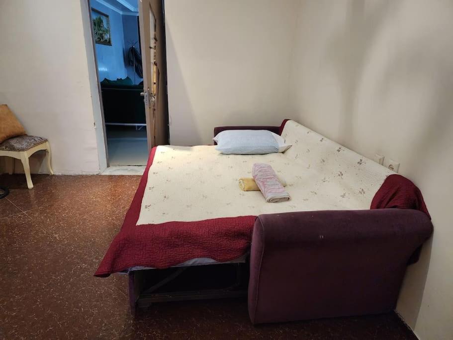Postel nebo postele na pokoji v ubytování Tamuna House in Tsikhidziri
