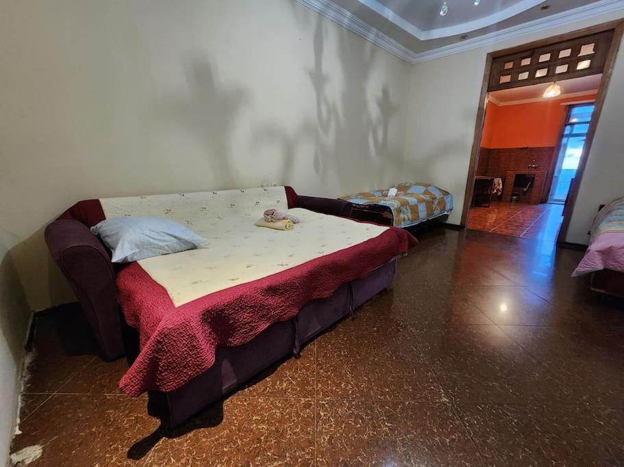 Postel nebo postele na pokoji v ubytování Tamuna House in Tsikhidziri