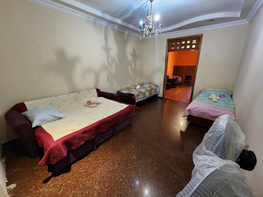 Postel nebo postele na pokoji v ubytování Tamuna House in Tsikhidziri