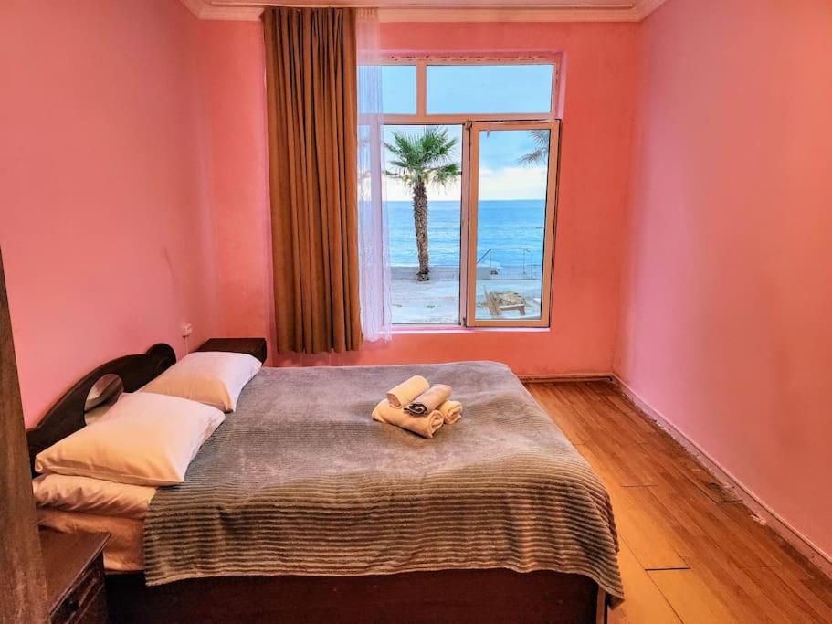 Postel nebo postele na pokoji v ubytování Tamuna House in Tsikhidziri