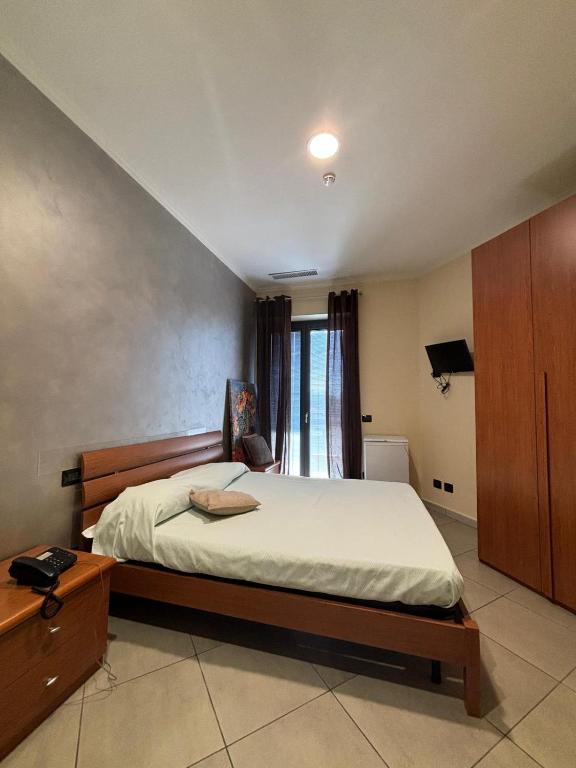 Postel nebo postele na pokoji v ubytování La Terrazza Ceprano