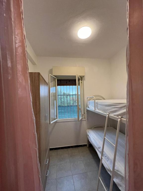 Postel nebo postele na pokoji v ubytování Residence Toscano