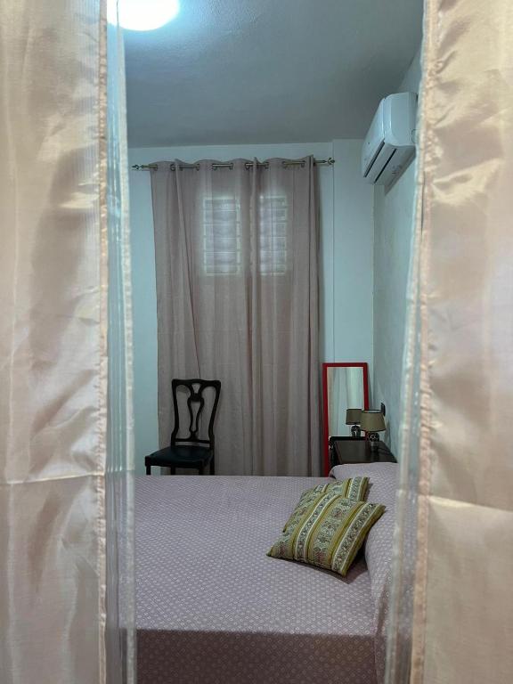 Postel nebo postele na pokoji v ubytování Residence Toscano