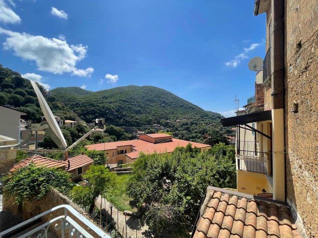 a view of a mountain from a building at Medioevo Mare in Pisciotta