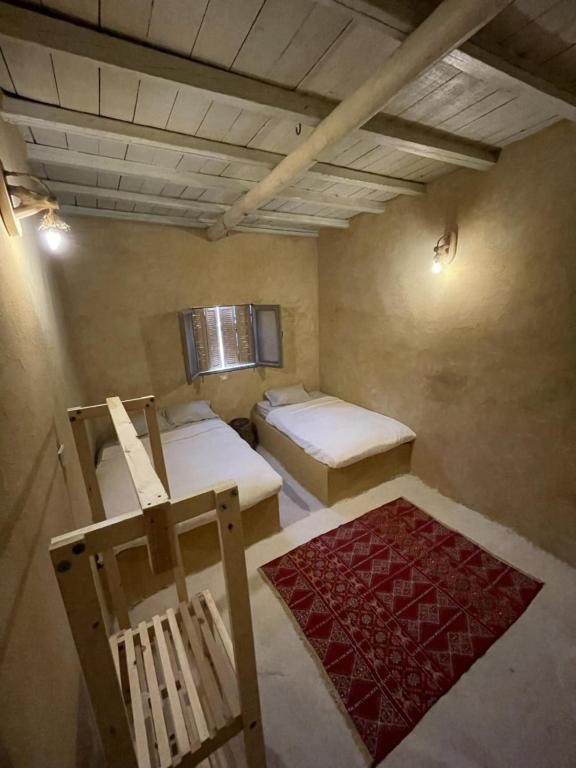 Postel nebo postele na pokoji v ubytování Lotus House