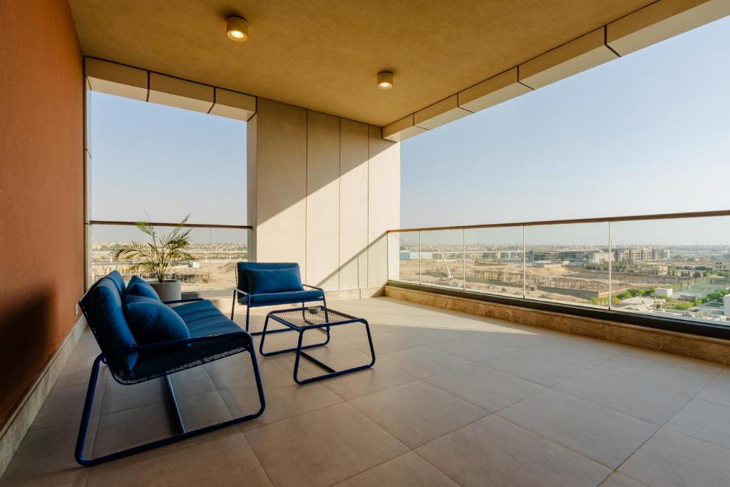 Posezení v ubytování Brassbell l Sheikh Zayed l Aeon Towers