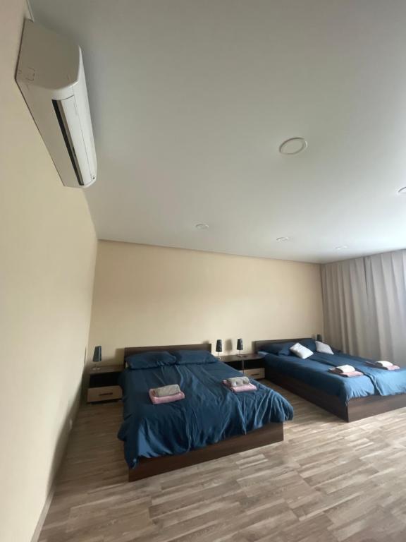 Postel nebo postele na pokoji v ubytování Apartmánový dom Ametyst