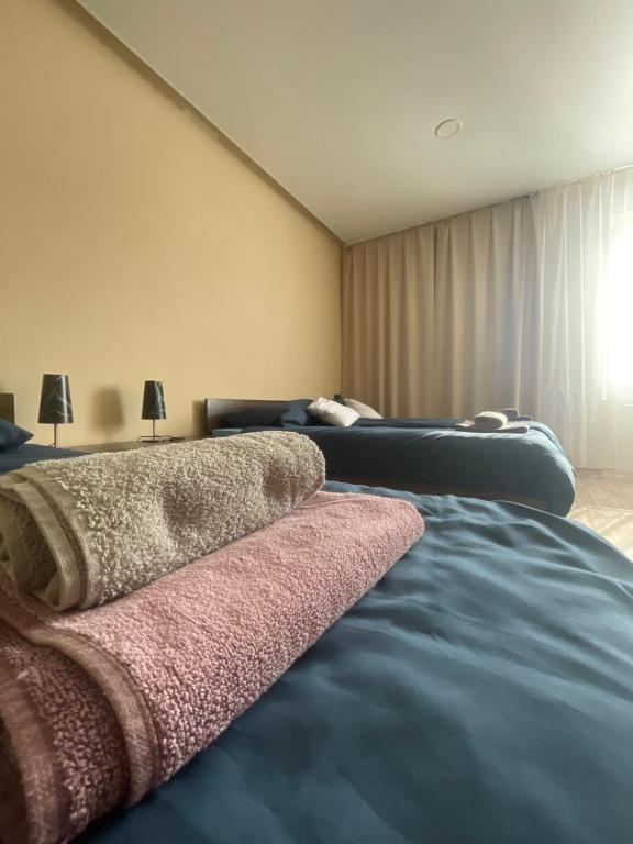 Postel nebo postele na pokoji v ubytování Apartmánový dom Ametyst