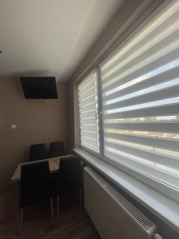 TV a/nebo společenská místnost v ubytování Apartmánový dom Ametyst