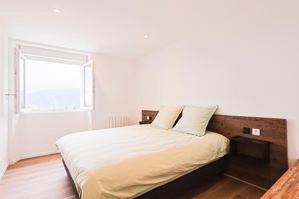 Postel nebo postele na pokoji v ubytování Appartements Les Vosges