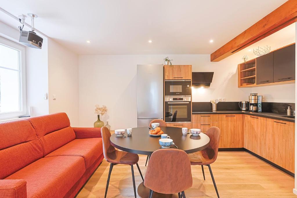 Kuchyň nebo kuchyňský kout v ubytování Appartements Les Vosges