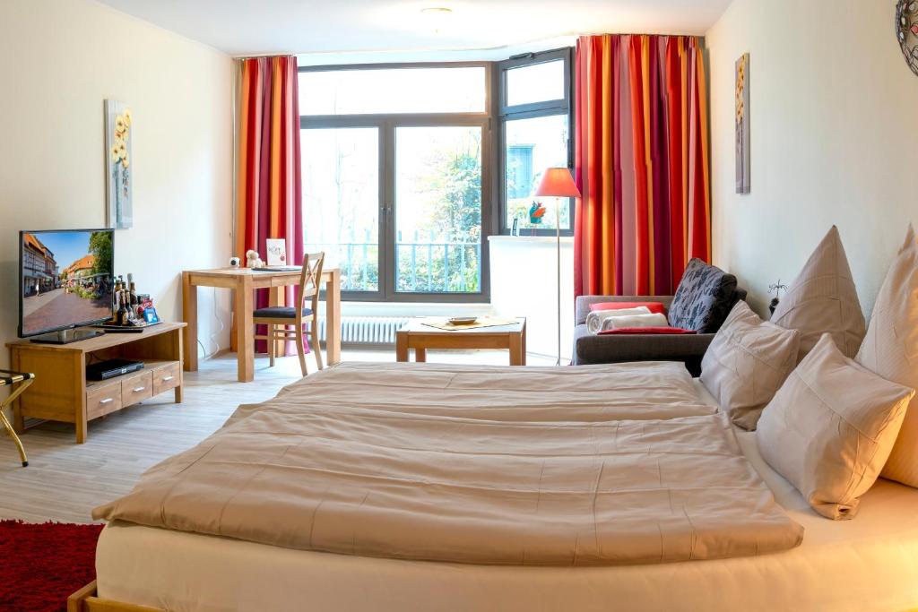 Postel nebo postele na pokoji v ubytování Haus Roseneck mit gratis Zugang zur Jod-Sole-Therme