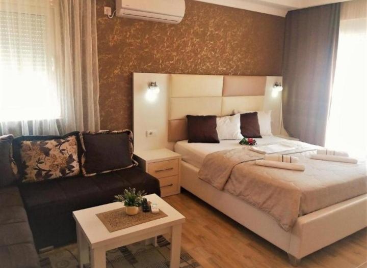 Postel nebo postele na pokoji v ubytování Apartmants Elisa