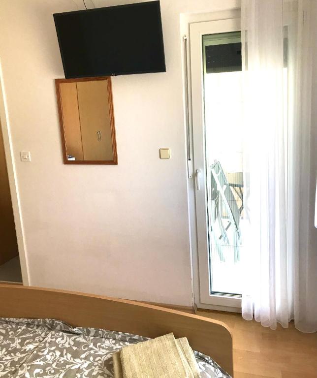 TV a/nebo společenská místnost v ubytování Guesthouse Pejo