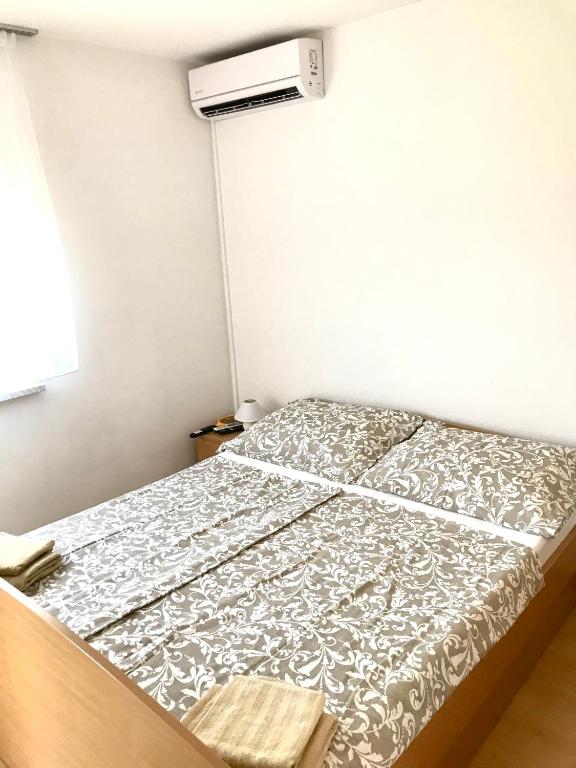 Postel nebo postele na pokoji v ubytování Guesthouse Pejo