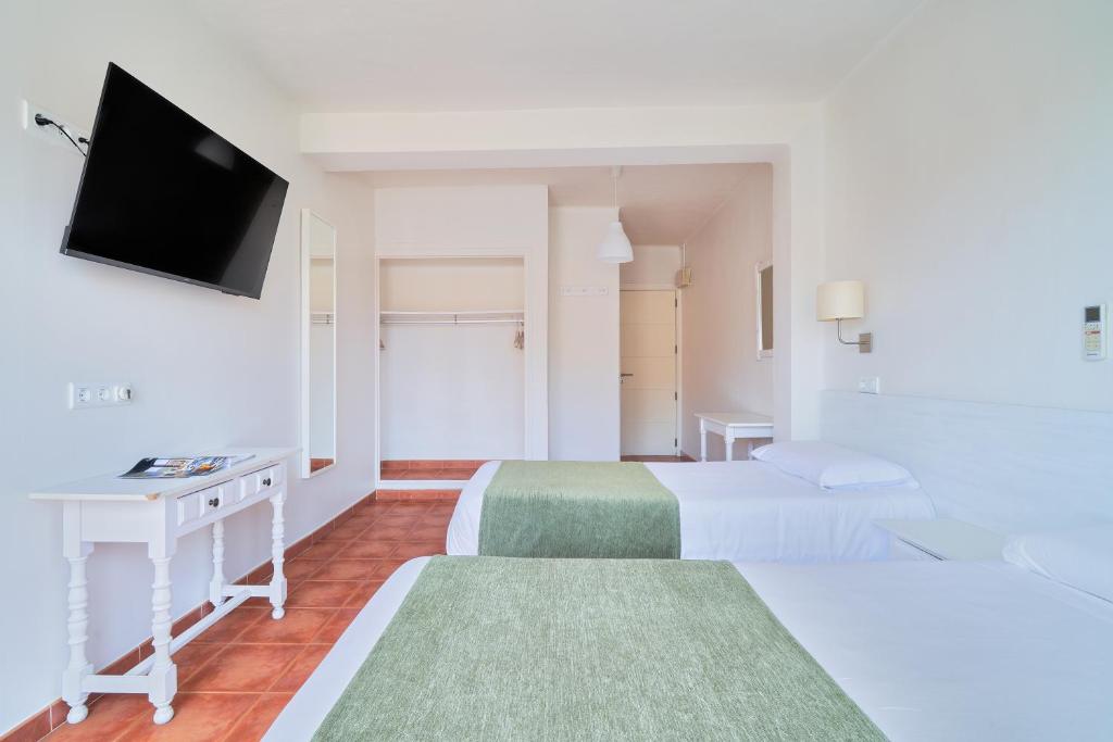 TV a/nebo společenská místnost v ubytování Hostal Sol y Miel