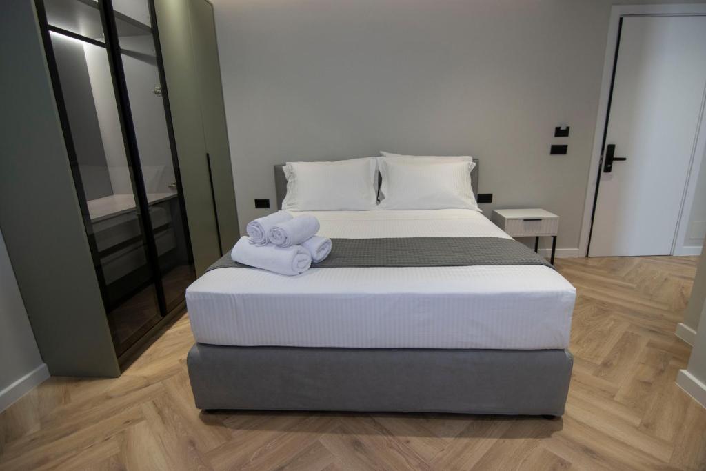 Postel nebo postele na pokoji v ubytování Mina Luxury Rooms
