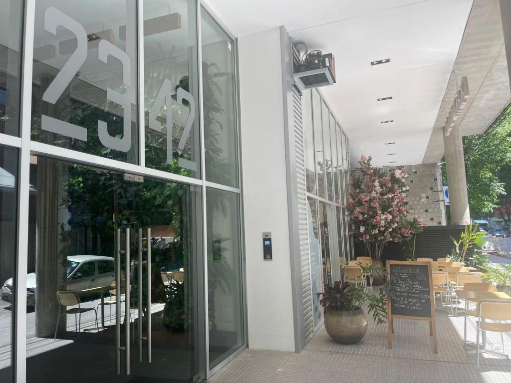 a store front with a sign on the side of a building at Dolce Apartment in Buenos Aires