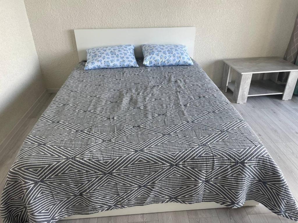 Postel nebo postele na pokoji v ubytování Шатман