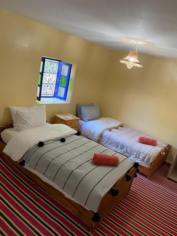 Postel nebo postele na pokoji v ubytování Gîte Imarin