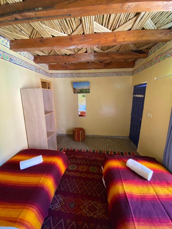 Postel nebo postele na pokoji v ubytování Gîte Imarin