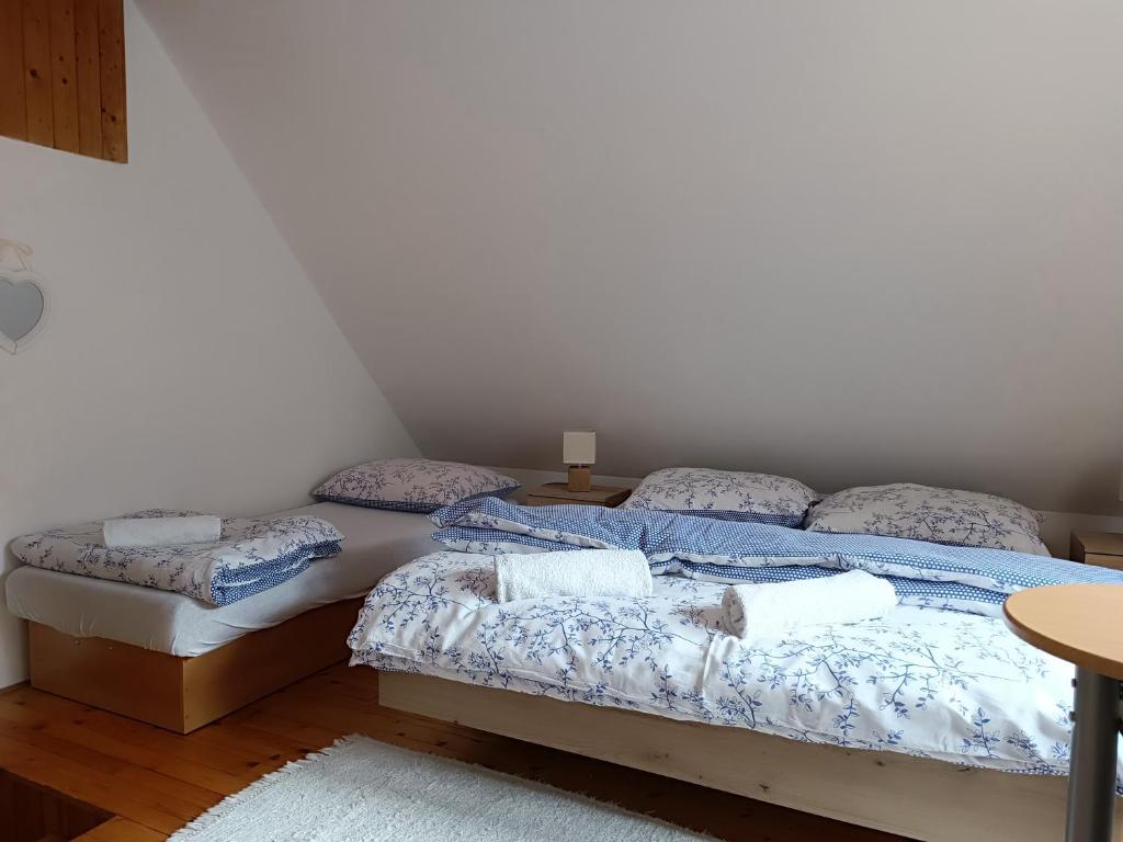 Postel nebo postele na pokoji v ubytování Vilka Tkáč