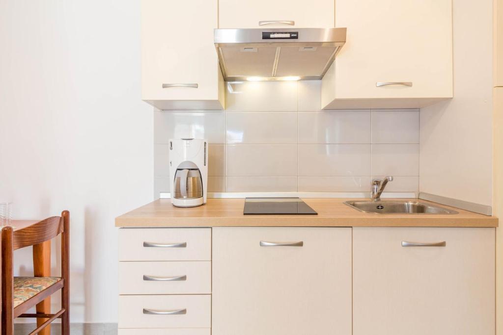 Kuchnia lub aneks kuchenny w obiekcie Apartment MiMa