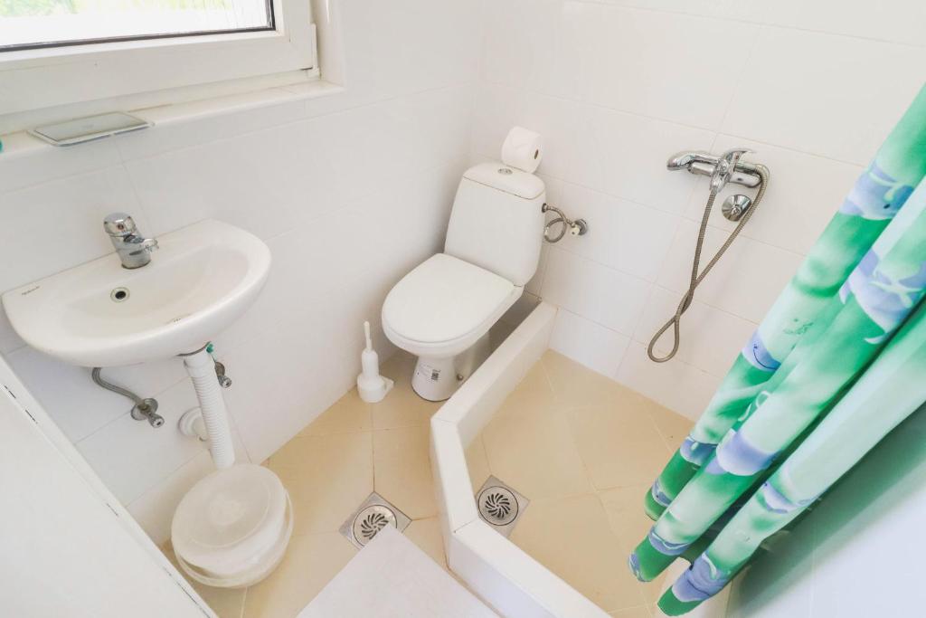 Ванна кімната в Ratac Eco Guest House