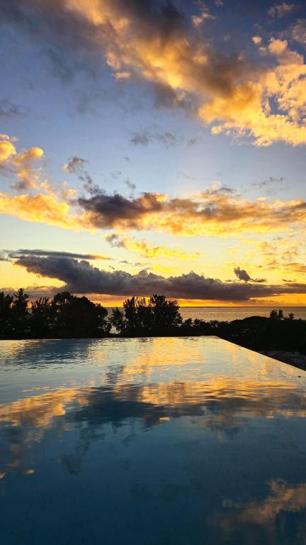 Image showcasing Luxury Penthouse with Infinity Pool & Stunning Sea View, Flic-en-Flac ...