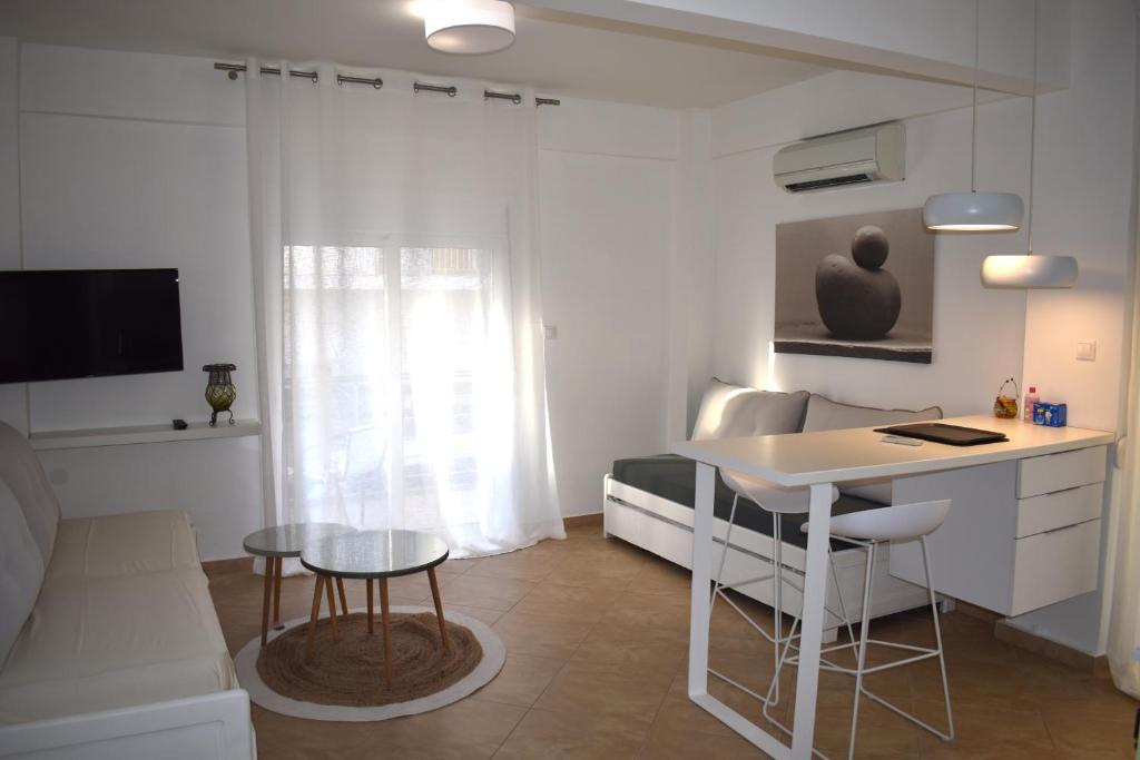 TV a/nebo společenská místnost v ubytování Jasmine Apartment