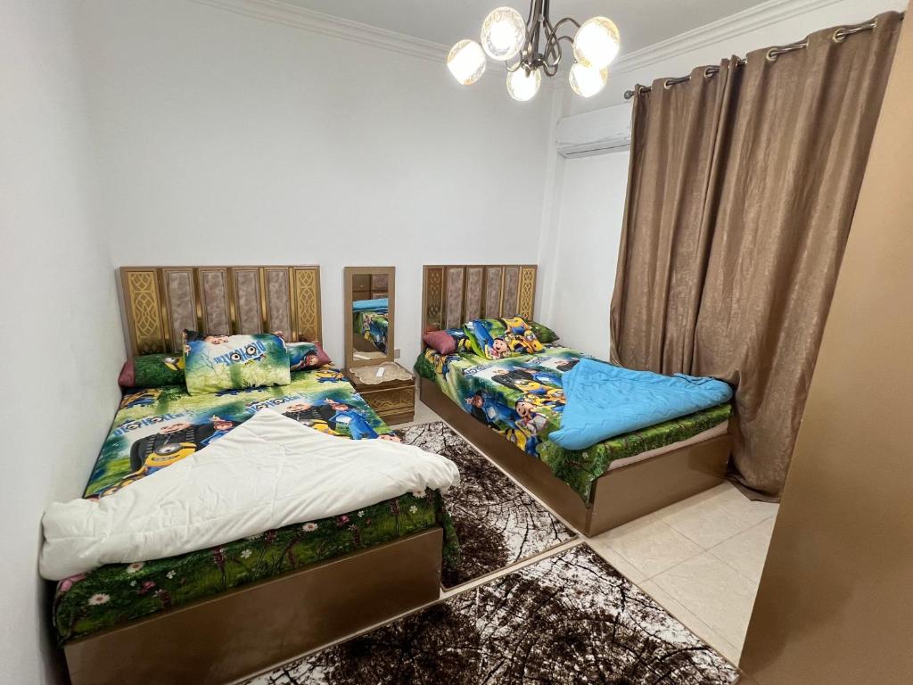 Кровать или кровати в номере Gardenia city apartments - 57051