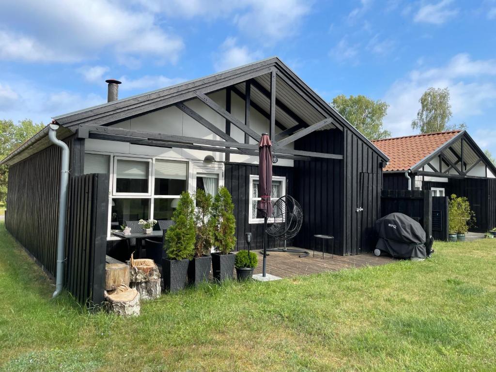 Zahrada ubytování Charmerende sommerhus - 200 m fra stranden