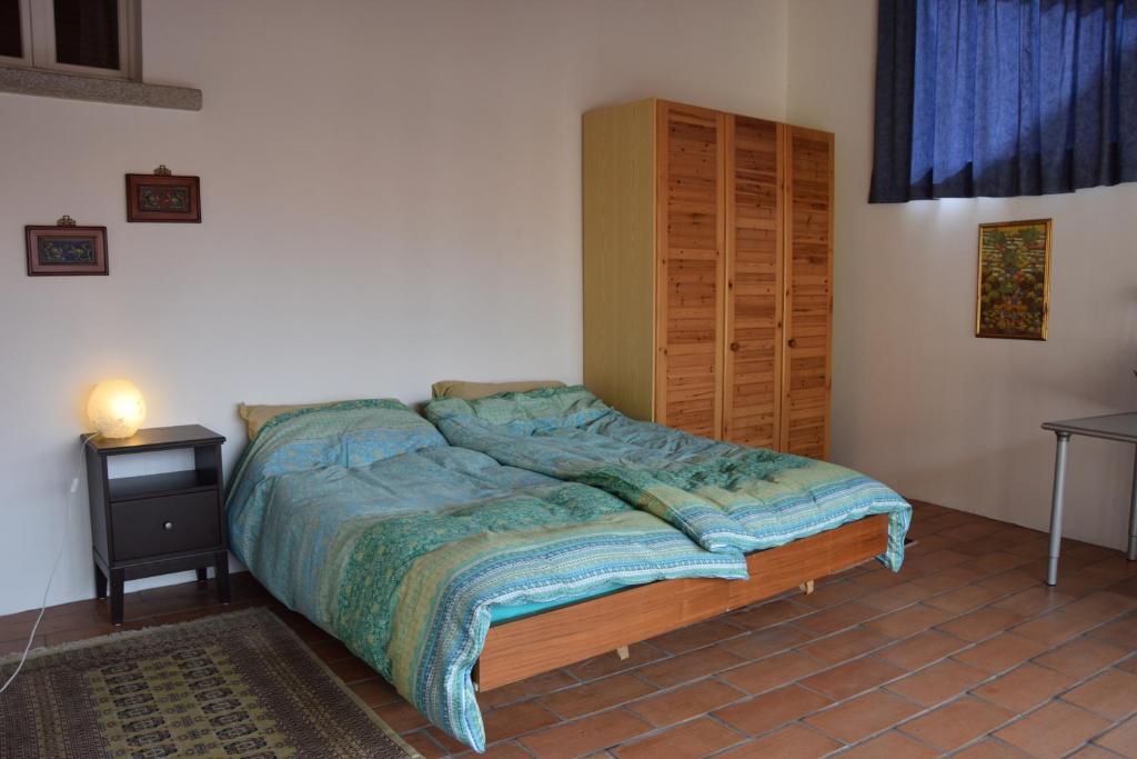 Postel nebo postele na pokoji v ubytování Casa Boff