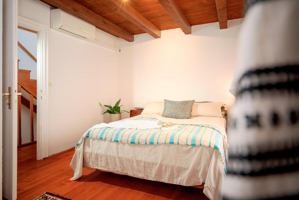 Postel nebo postele na pokoji v ubytování Casa Marlonito