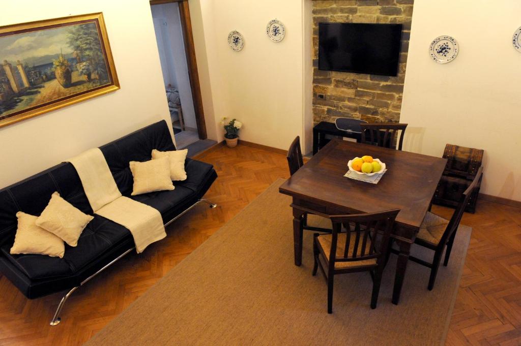 A seating area at ARIA DI CASA APARTMENT