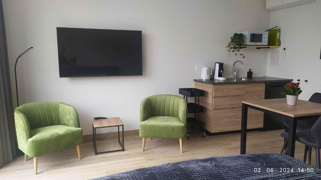 Kuchyň nebo kuchyňský kout v ubytování B&B Plattestien