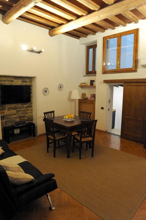 A seating area at ARIA DI CASA APARTMENT