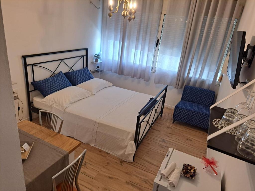 Postel nebo postele na pokoji v ubytování A&A Rooms