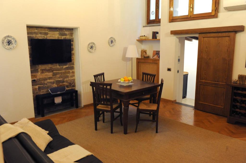 A seating area at ARIA DI CASA APARTMENT