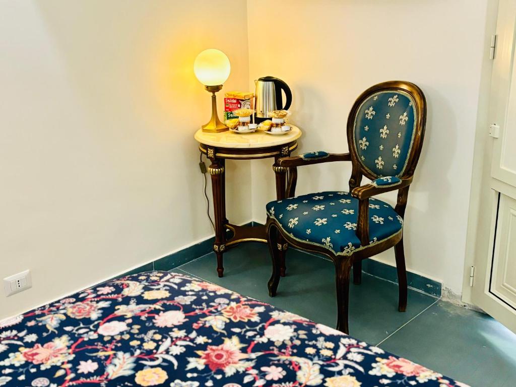 Postel nebo postele na pokoji v ubytování Sangiuliano Suite