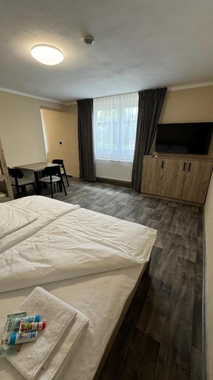 Postel nebo postele na pokoji v ubytování Ubytování U Pupka