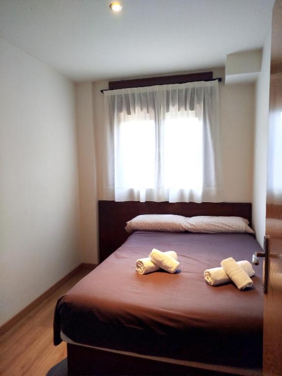 Postel nebo postele na pokoji v ubytování Apartament Cal Cinto