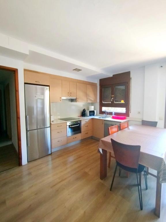 Kuchyň nebo kuchyňský kout v ubytování Apartament Cal Cinto
