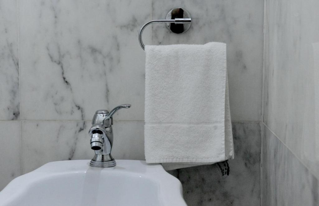 A bathroom at ARIA DI CASA APARTMENT