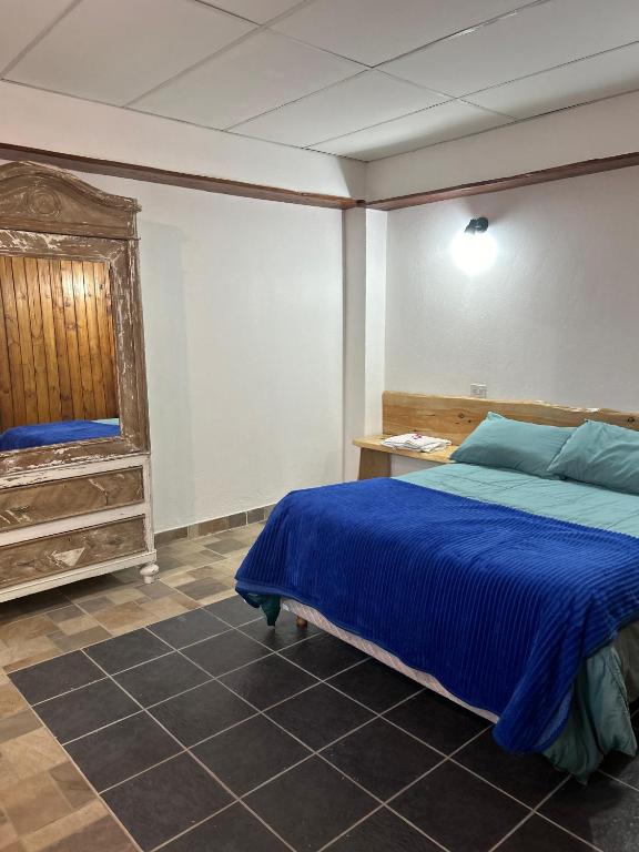 Letto o letti in una camera di Jireh