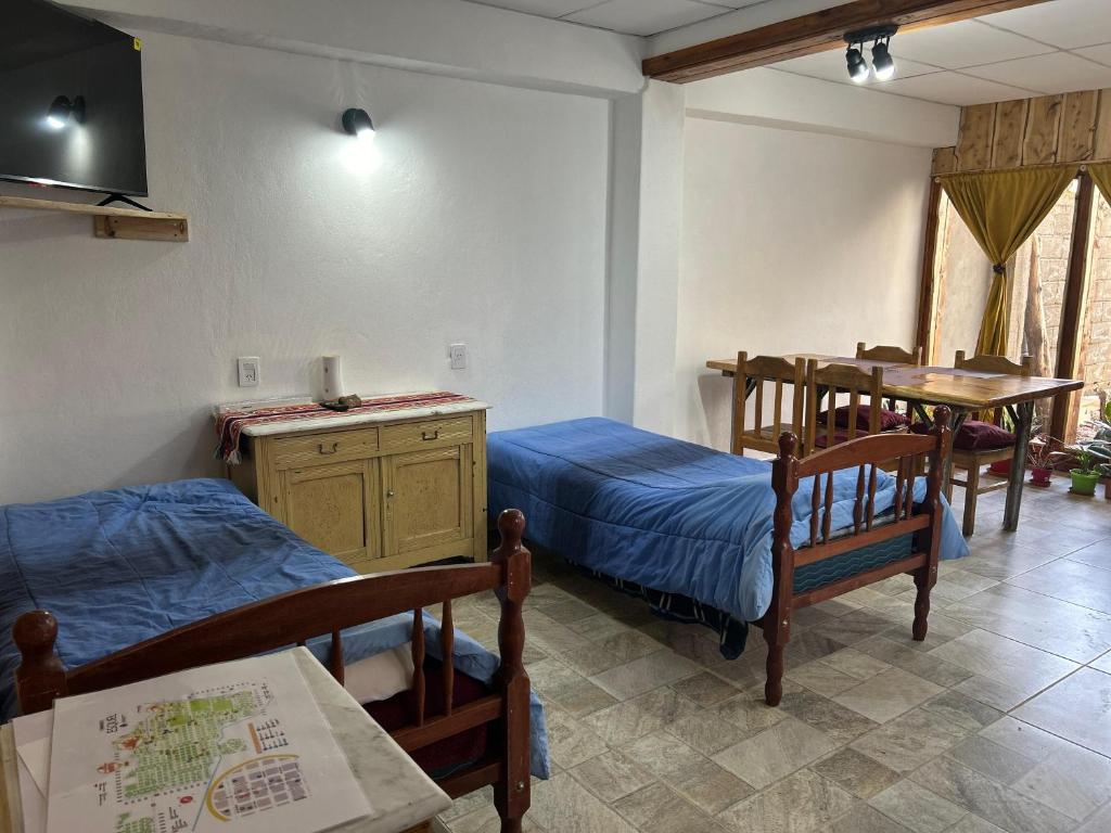 Letto o letti in una camera di Jireh