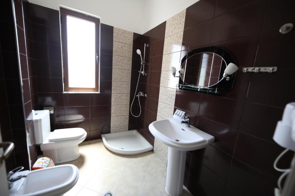 Koupelna v ubytování Hotel Erjuma