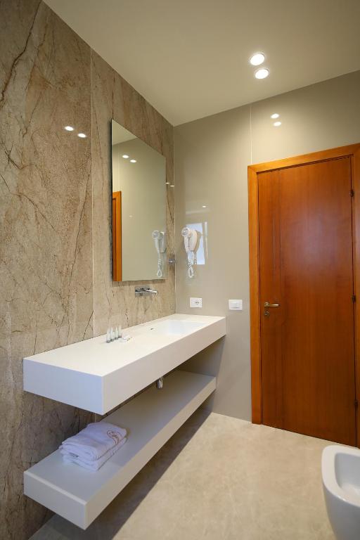 Koupelna v ubytování Hotel Erjuma